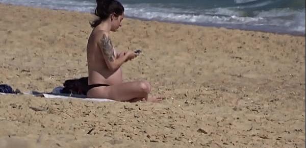  Beautiful busty pregnant topless at the beach 06